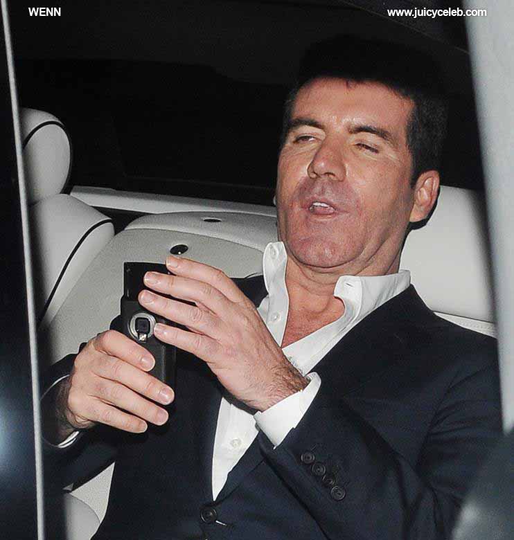 Simon Cowell looking rather worse for wear outside the May Fair hotel for the Penthouse Party, after the live Saturday night 'X Factor' show London, England - 24.10.09 Mandatory Credit WENN.com Where: London, United Kingdom When: 24 Oct 2009 Credit: WENN